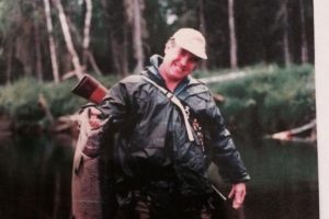 man in Alaska fishing